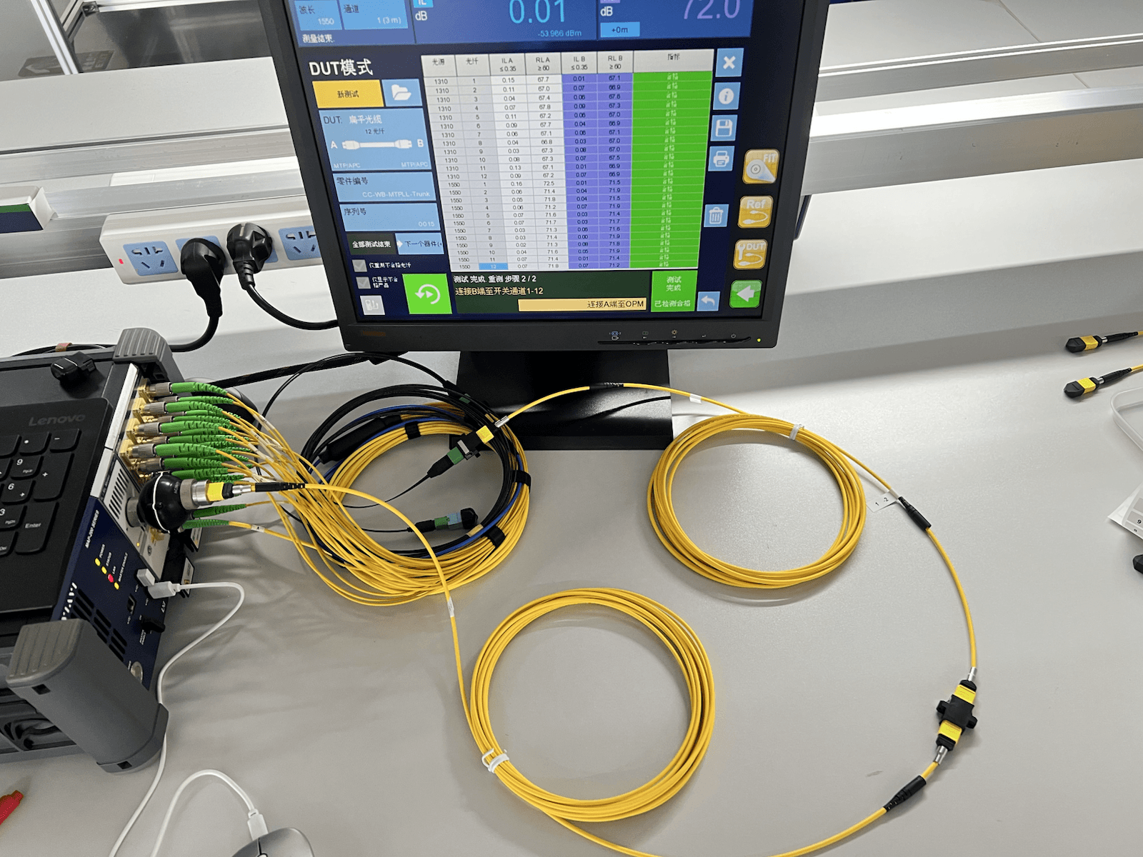 Fiber cable assembly connected to VIAVI optical testing equipment